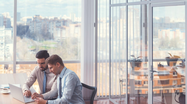 Business people signing a contract